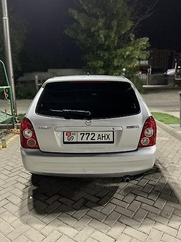 mazda 121: Mazda Familia: 2003 г., Автомат, Бензин, Хэтчбэк — 2