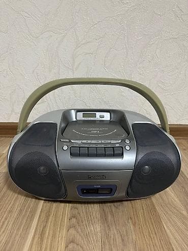 Портативный CD-плеер Panasonic RX-DS29 с радиоприемником. Компактная