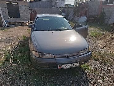 bid e2: Mazda 323: 1992 г., 1.8 л, Ручные, Бензин, Седан — 5