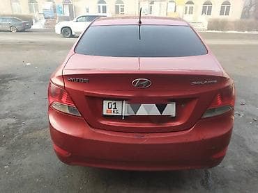 киа 2010: Hyundai Solaris: 2011 г., 1.6 л, Механика, Бензин, Седан — 4