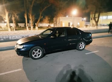 Toyota Carina E: 1995 г., 1.6 л, Механика, Бензин, Седан