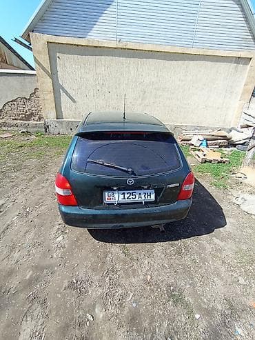 Mazda 323: 1999 г., 1.5 л, Механика, Бензин, Хэтчбэк