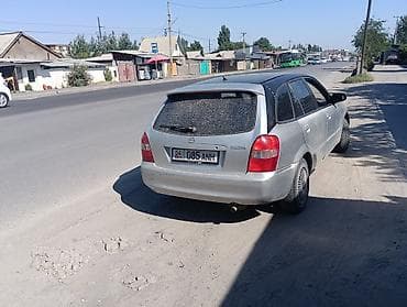 Mazda Familia: 1999 г., 1.5 л, Автомат, Бензин, Универсал — 3
