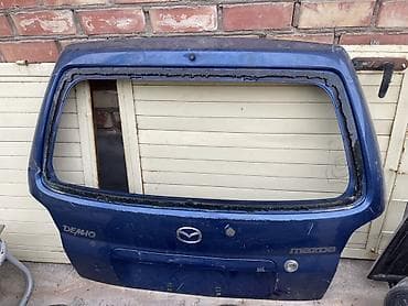 мазда капелла фара: Крышка багажника Mazda, Оригинал — 1