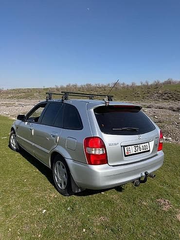 saab 93: Mazda 323: 2002 г., 1.6 л, Ручные, Бензин, Универсал — 5