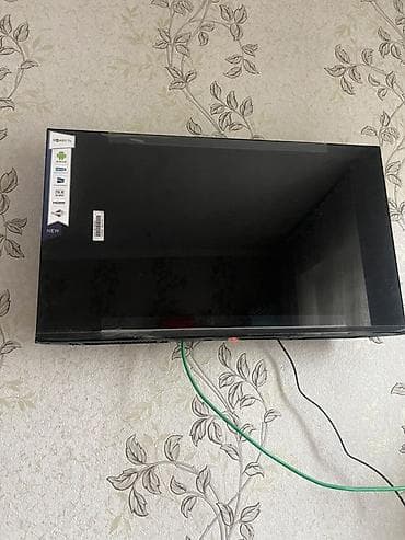 android 2din: Смарт‑телевизор на Android TV, установлен на настенном креплении — 1