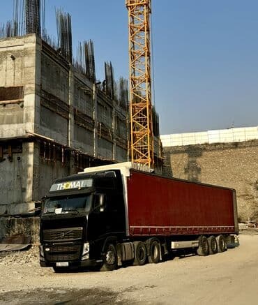 купить вольво тандем в европе: Тягач, Volvo, 2012 г., Тентованный — 1