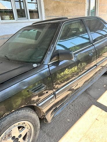 Audi: Audi 100: 1987 г., Седан — 2
