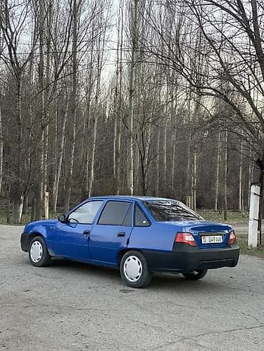 стеклоподъёмник 124: Седан синего цвета с тонировкой задних стекол и черными некрашеными — 5