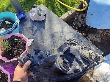 насадка на глушитель с подсветкой: Передняя левая фара Lexus — 2