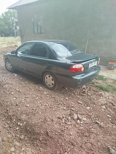 Транспорт: Kia Sephia: 1998 г., 1.5 л, Механика, Бензин, Седан — 3