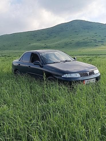 домкрат мазда: Mazda 323: 1999 г., Механика, Бензин, Седан — 1
