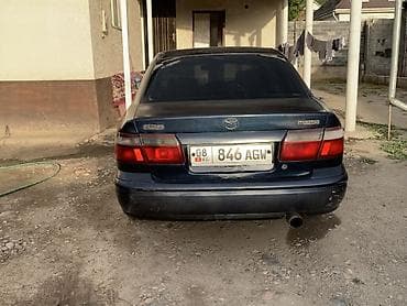 кирг шёлк: Mazda 626: 1998 г., 1.8 л, Кол менен иштөөчү, Бензин, Седан — 4