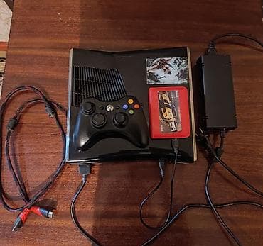 Портативные консоли: Игровая консоль Xbox 360 (Slim). Комплектация: - консоль Xbox 360 — 2