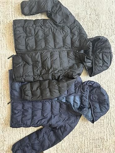 Верхняя одежда: Утеплённые стёганые куртки UNIQLO, размер 150 (детский/подростковый) — 1