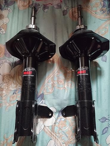 maz: Передний амортизатор Mazda Новый, Оригинал — 1