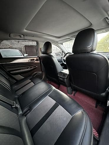 GAC: GAC Aion s белого цвета Кузов и внешность: - Динамичный дизайн — 7