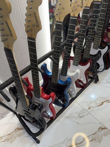 Гитаралар: Электрогитара новая, стратокастер, ST, Stratocaster. Все в наличии В — 9