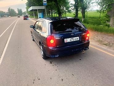 Mazda Familia: 2002 г., Хэтчбэк — 6