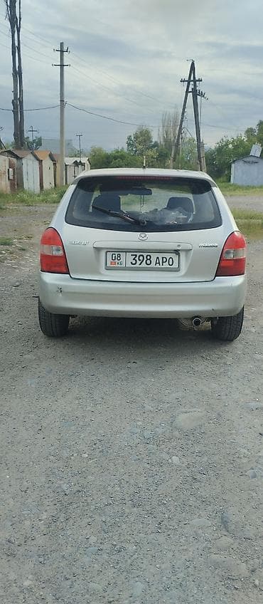митсубиси спейк стар: Mazda 323: 2001 г., 1.6 л, Механика, Газ, Хэтчбэк — 3