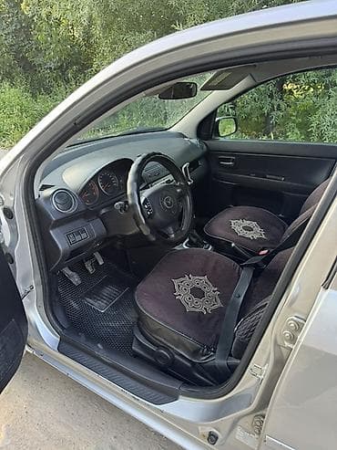 4 7: Mazda 2: 2006 г., 1.4 л, Механика, Газ, Хэтчбэк — 9