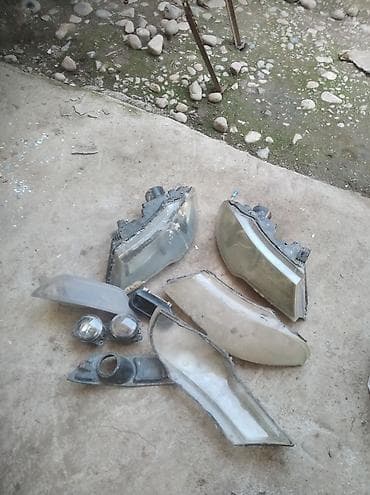 обшивка дверь: Комплект передних фар Daewoo 2011 г. — 1