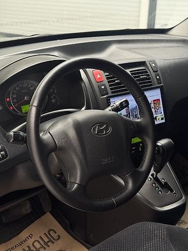 Транспорт: Hyundai Tucson: 2006 г., 2 л, Автомат, Бензин, Кроссовер — 9