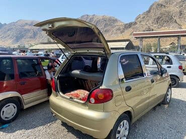 фары на опель вектра б: Хэтчбек Daewoo Matiz в цвете "золотой беж" с пятидверным кузовом — 5