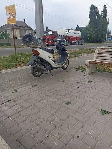 Скутер 50 см³ (ориентировочно класс Honda/Yamaha 2T/4T, компактный
