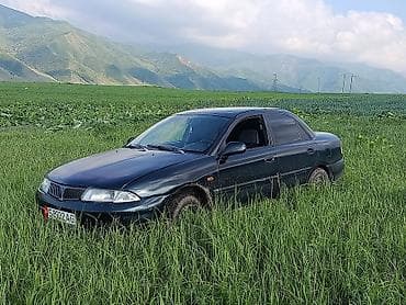 домкрат мазда: Mazda 323: 1999 г., Механика, Бензин, Седан — 3