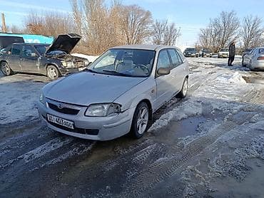 suzuki moto: Mazda 323: 2000 г., 1.6 л, Механика, Бензин, Универсал — 4