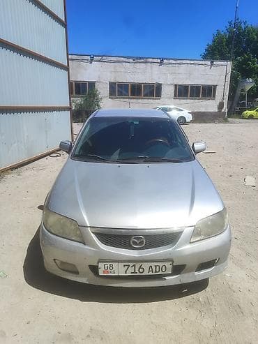 Mazda 323: 2002 г., 1.6 л, Механика, Бензин, Универсал