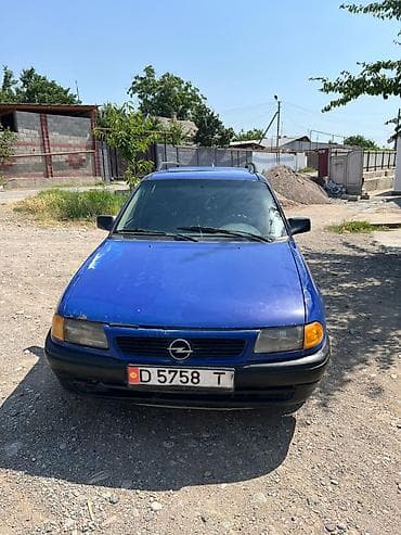 Продажа авто: Opel Astra F универсал, синий цвет. Основные особенности: - Кузов — 4
