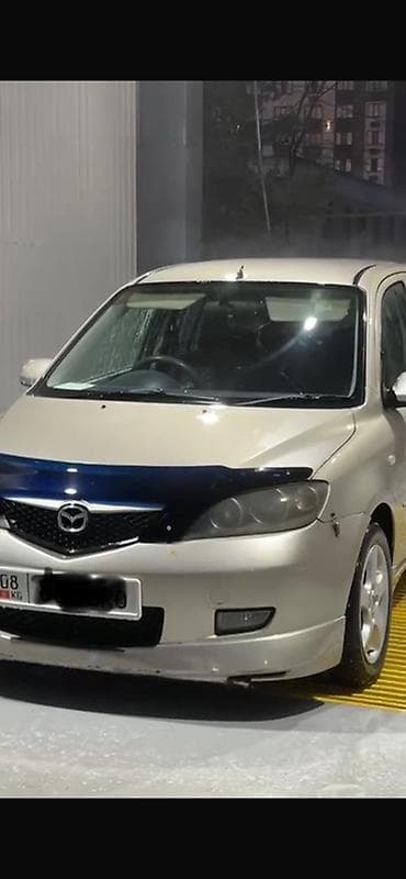 Mazda Demio: 2003 г., 1.5 л, Автомат, Бензин, Хэтчбэк