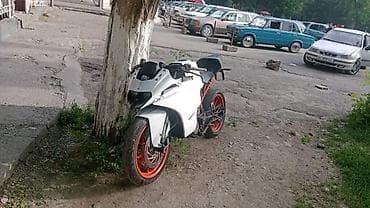 велосипед мото: Мотоцикл спорт-класса KTM RC: легкая трубчатая рама оранжевого цвета — 3