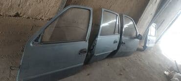 Кузовные детали: Дверь Комплект Daewoo, Оригинал — 2