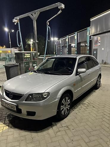 mazda 121: Mazda Familia: 2003 г., Автомат, Бензин, Хэтчбэк — 6