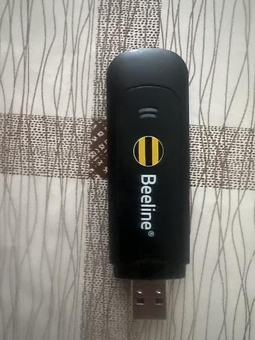 модем для ноутбука с безлимитным интернетом: USB‑модем Beeline Huawei Mobile Broadband (модель E1550) - Тип — 2