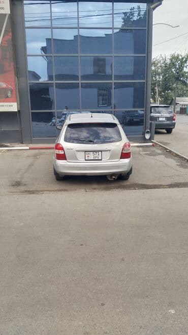 купить нексия 2: Mazda 323: 2002 г., 1.6 л, Автомат, Бензиновая, Хэтчбэк — 7