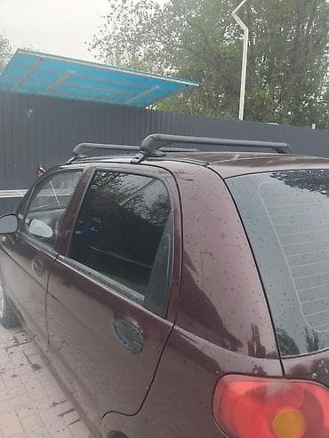 аудио системы: Компактный городской хэтчбек с поперечными рейлингами и багажником на — 4