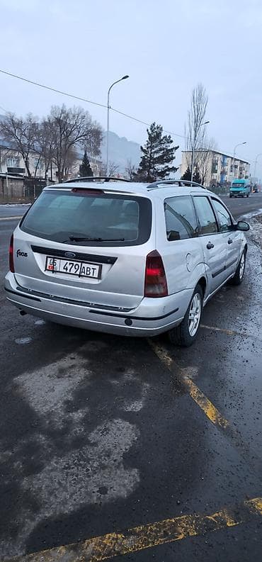 протер 2: Ford Focus: 2001 г., 1.6 л, Автомат, Бензин, Универсал — 1