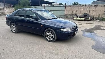 124 e500: Mazda 626: 2000 г., 2 л, Механика, Бензин, Седан — 2