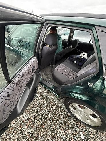 mazda 323 авто: Mazda 323: 2000 г., 1.6 л, Механика, Бензин, Универсал — 9