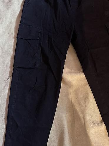 спорт шорты: Три пары женских брюк -100сом 1) Черные карго-брюки: - Прямой крой — 2