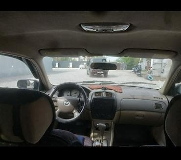protege: Mazda Familia: 2001 г., 1.5 л, Автомат, Бензин, Седан — 4