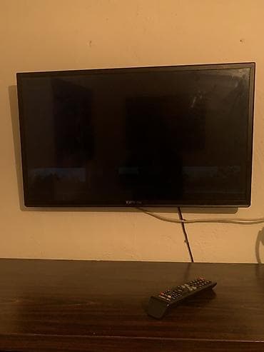 dvd mpeg4: Телевизор TSM HD (диагональ около 24–28"). Плоская LED‑панель, тонкие — 1