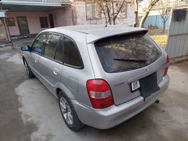 продаю или меняю на недвижимость: Mazda 323: 2002 г., 1.6 л, Механика, Бензин, Хэтчбэк — 4