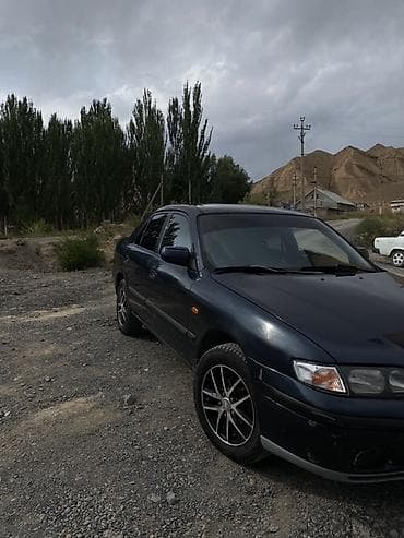 диски борбет а: Mazda 626: 1998 г., Механика, Седан — 5