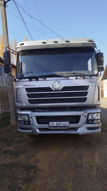 сорок трактор: Самосвал Shacman (Shaanxi) 6x4 Характеристики и особенности: - — 1
