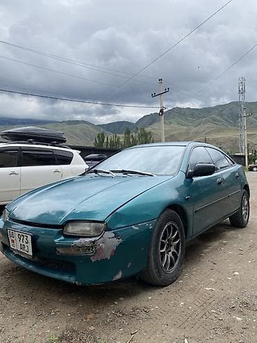 legacy bm: Mazda Lantis: 1994 г., 1.6 л, Механика, Бензин, Седан — 2